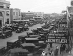 Automobiles line Walker Street in downtown Breckenridge, Texas by Basil Clemons 1887-1964