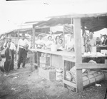 African American musicians and a group of customers standing at a food pavilion by Basil Clemons 1887-1964