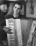 Musicians; Walter Zuercher plays an accordion, Breckenridge, Texas by Basil Clemons 1887-1964