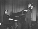 Musicians; Mr. and Mrs. R. B. Gunn playing violin and piano, Breckenridge, Texas by Basil Clemons 1887-1964