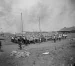 Men spreading out large circus tent in an open field, Breckenridge, Texas by Basil Clemons 1887-1964