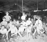 Circus workers in a large tent with horses, Breckenridge, Texas by Basil Clemons 1887-1964