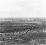 Aerial view of oil field with many oil derricks across the landscape; photo labeled "North," near Breckenridge, Texass by Basil Clemons 1887-1964