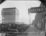 Downtown Breckenridge, Texas, during construction of The Burch Hotel; Sager Hotel nearby; photographer's description includes town "wired by Strawbridge Electric Co." by Basil Clemons 1887-1964