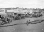 Ellisville, Texas, settlement with Faw & Wright Men's Store, Garage, and other establishments by Basil Clemons 1887-1964