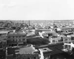 Looking northeast from the courthouse dome over town settlement including Hotel Pearson, Alamo Hotel, and Court Airdome with many oil derricks in and beyond the town limits, Breckenridge, Texass by Basil Clemons 1887-1964