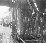 Group of men in work clothes and suits, Miller Brothers Gurney No. 1 oil field, undated by Basil Clemons 1887-1964