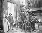 The casing crew, a group of men stand beside oil field equipment; Breckenridge, Texas, oil field by Basil Clemons 1887-1964