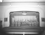 Breckenridge High School Buckaroo Band on stage in the school auditorium, Breckenridge, Texas by Basil Clemons 1887-1964