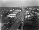 Air view of a parade through downtown Breckenridge, Texas by Basil Clemons 1887-1964