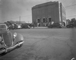 Cars pulling up and people standing in front of the First Methodist Church, Breckenridge, Texas by Basil Clemons 1887-1964