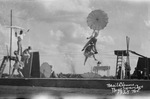 Five high-wire circus performers walk a tightrope in Breckenridge, Texas by Basil Clemons 1887-1964