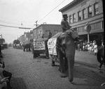 Circus parade in downtown Breckenridge, Texas by Basil Clemons 1887-1964