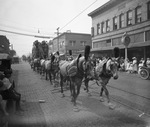 Circus parade in downtown Breckenridge, Texas by Basil Clemons 1887-1964