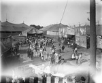 Main Entrance to the John Robinson's Circus with people milling around, Breckenridge, Texas by Basil Clemons 1887-1964