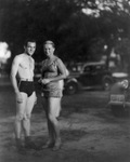 A man and woman in swimming suits by Basil Clemons