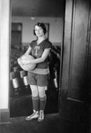 A female basketball player by Basil Clemons