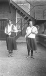 Two female tennis players by Basil Clemons