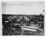 The Southwestern Exposition and Fat Stock Show's "The Whip" and Ferris wheel by Basil Clemons