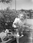 Young girl at Easter by Basil Clemons 1887-1964