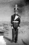 Young man wearing a military uniform by Basil Clemons 1887-1964