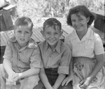 Two young boys and a young girl by Basil Clemons 1887-1964