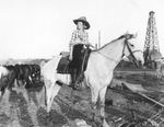 Cowgirl on horse, Breckenridge, Texas, 1921 by Basil Clemons 1887-1964