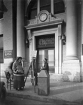 Salvation Army bellringer in front of bank, 1925 by Basil Clemons 1887-1964