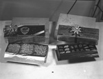 Two Christmas-themed boxes of King's Chocolates by Bill Wood Photo Company