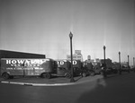 Row of Howard Van Lines moving vans by Bill Wood Photo Company