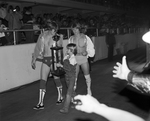 Wrestling at Will Rogers Coliseum; David and Kevin Von Erich with trophy by Cirrus Bonneau