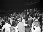 Wrestling at Will Rogers Coliseum; men with "Von Erich World Tour, 1983-1984" jackets by Cirrus Bonneau