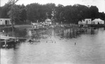 People swimming and enjoying outdoor activities at Holland's Lake near Weatherford, Texas