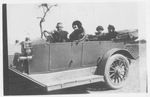 Holland (?) family in an automobile