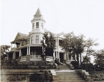 Colonel George Morland Bowie sitting on the steps of his Weatherford, Texas home