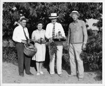 Amon Carter with the Holland family