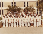 UTA nursing students in front of the Central Library