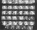 Contact sheet of David Keens working in his office at University of Texas at Arlington (U. T. A.)