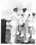 Admiral Chester W. Nimitz awards The Navy Cross to SC2 Doris (Dorie) Miller for heroism on U.S.S. West Virginia battleship