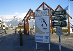 Signs in Ushuaia, Argentina, labeling the Tierra del Fuego province, the South Atlantic Islands, and Antarctica.