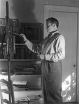 Dickson Reeder standing at easel