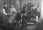 Dickson and Flora Reeder playing instruments at a party by Sybil Wilson