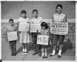 Helen Martinez and her four children with picket signs, San Antonio, Texas