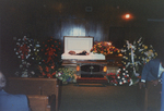 A photograph of an unidentified African American man in a casket