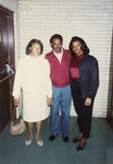 A photograph of two unidentified African American women and one unidentified African American man