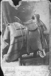 Cabinet card showing saddle made by W.H. Wilson, Nocona, Texas