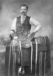 Cabinet card showing saddle made by W.H. Wilson, Nocona, Texas