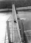 Nocona suspension bridge at Ketchum Bluff; Ford on bridge, Texas