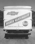 A Hooker Vandergriff advertisement on back of a truck