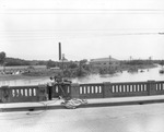 WBAP cameraman filming Trinity River flood waters from the 7th Street bridge during 1949's flood